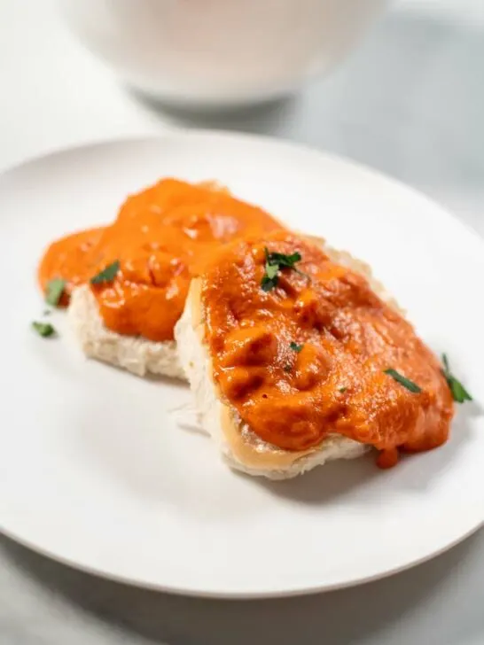 Closeup on a serving of biscuits with Tomato Gravy.