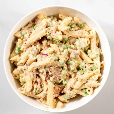 Top view of a large serving bowl full of Tuna Pasta Salad.