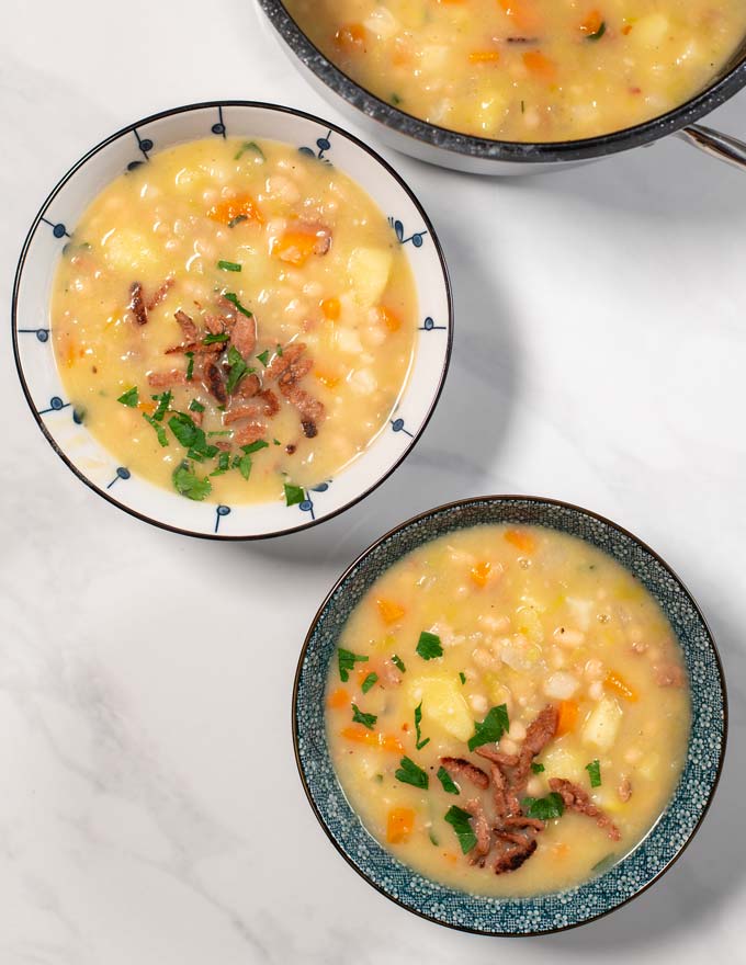 Top view on two portions of White Bean Soup.