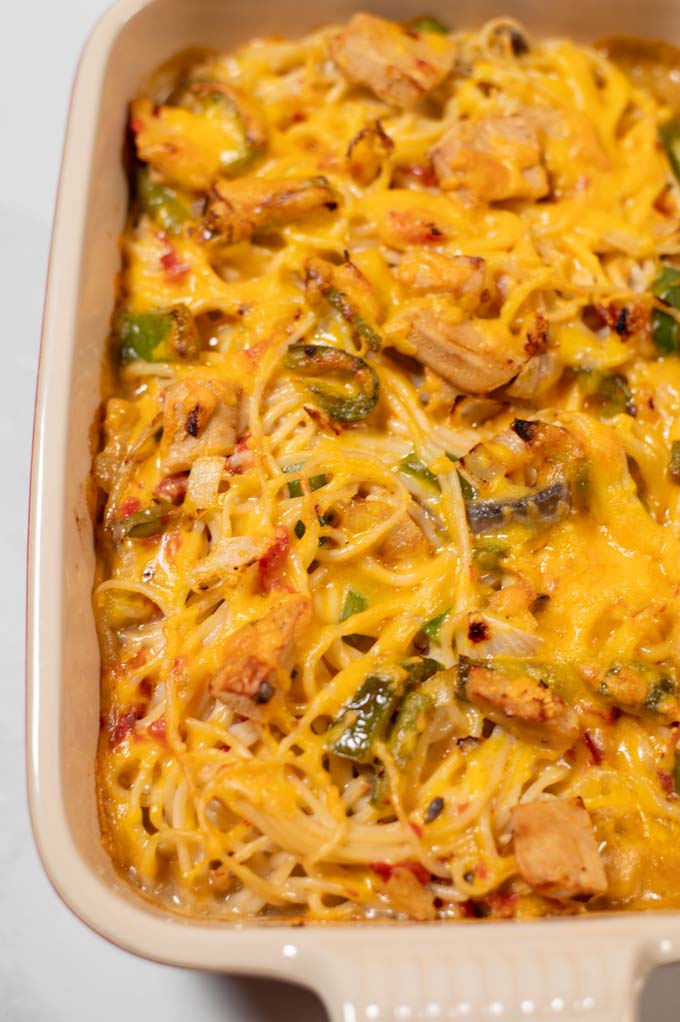 Closeup of cheesy topping of baked Texas Chicken Spaghetti.