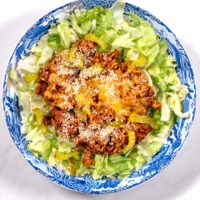 Serving of Keto Big Mac Casserole on crispy lettuce.