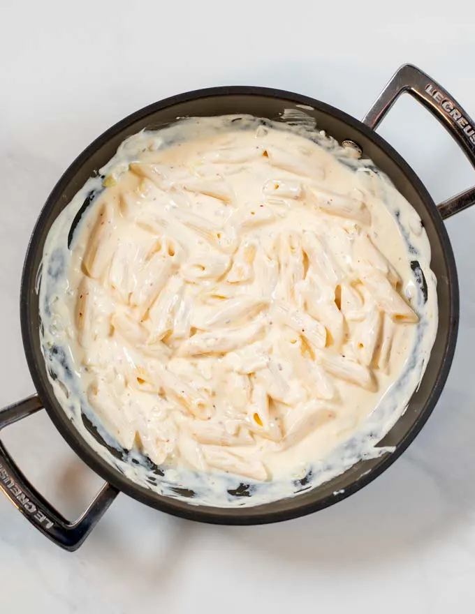 Top view on a serving of Spicy Alfredo Pasta.