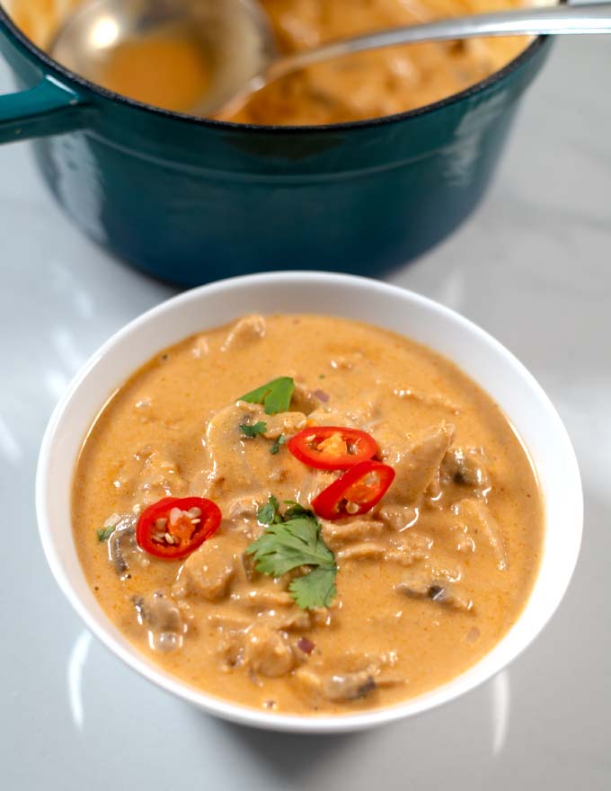 Tom Kha Soup in a serving bowl.