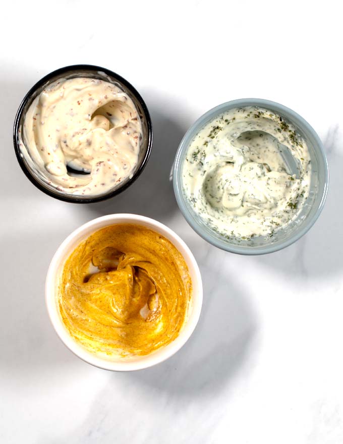 Top view of small bowls with the three flavors of the Chicken Tenders Dipping Sauces.