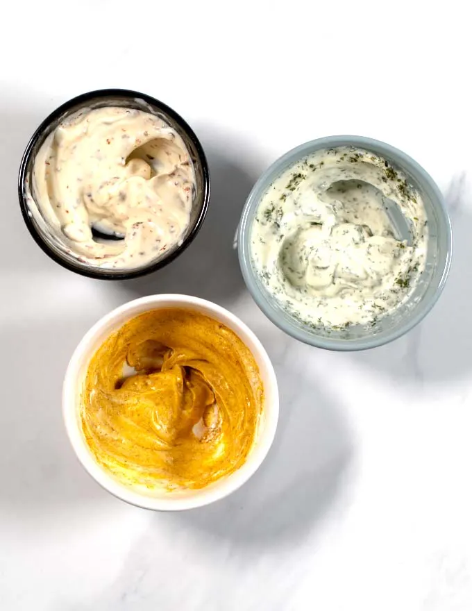 Top view of small bowls with the three flavors of the Chicken Tenders Dipping Sauces.