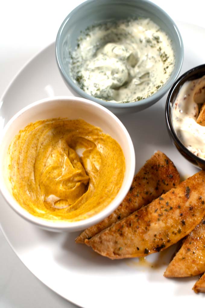 A serving of Baked Chicken Tenders with Dipping Sauces.