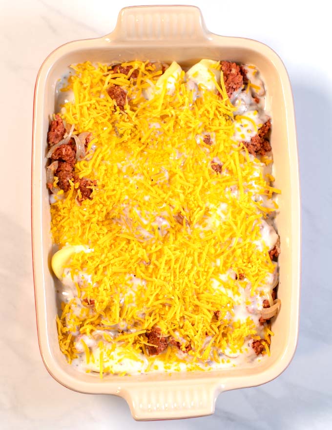 Top view of the Hamburger Potato Casserole covered with cheese.