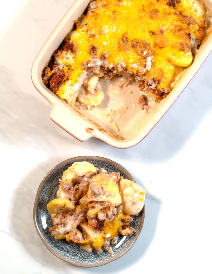 Top view of the casserole dish with a serving of the Hamburger Potato Casserole.