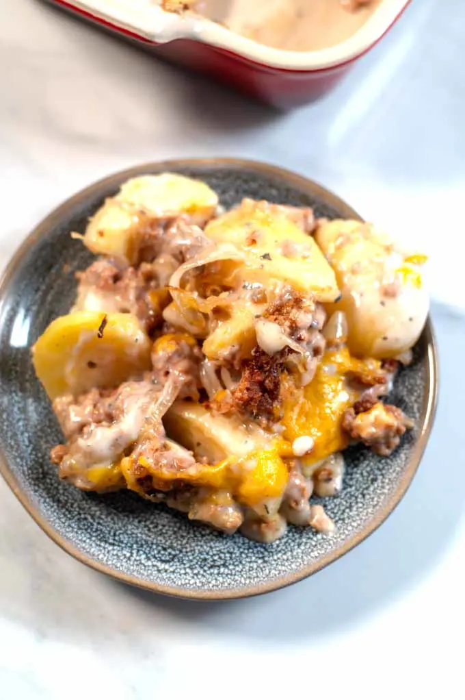 Closeup on a single serving portion of Hamburger Potato Casserole.