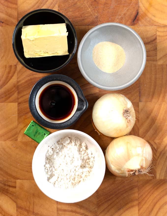 Ingredients needed to make Southern Onion Dressing collected on a board.