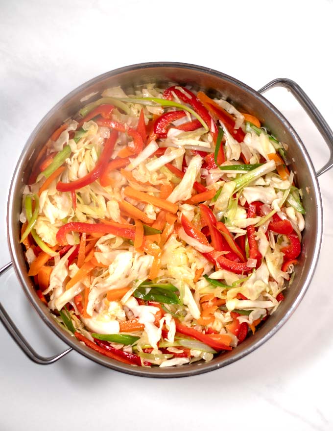 Top view of a large skillet in the process of making this dish.