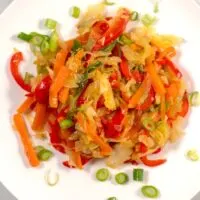 Jamaican Steamed Cabbage is served on a plate.