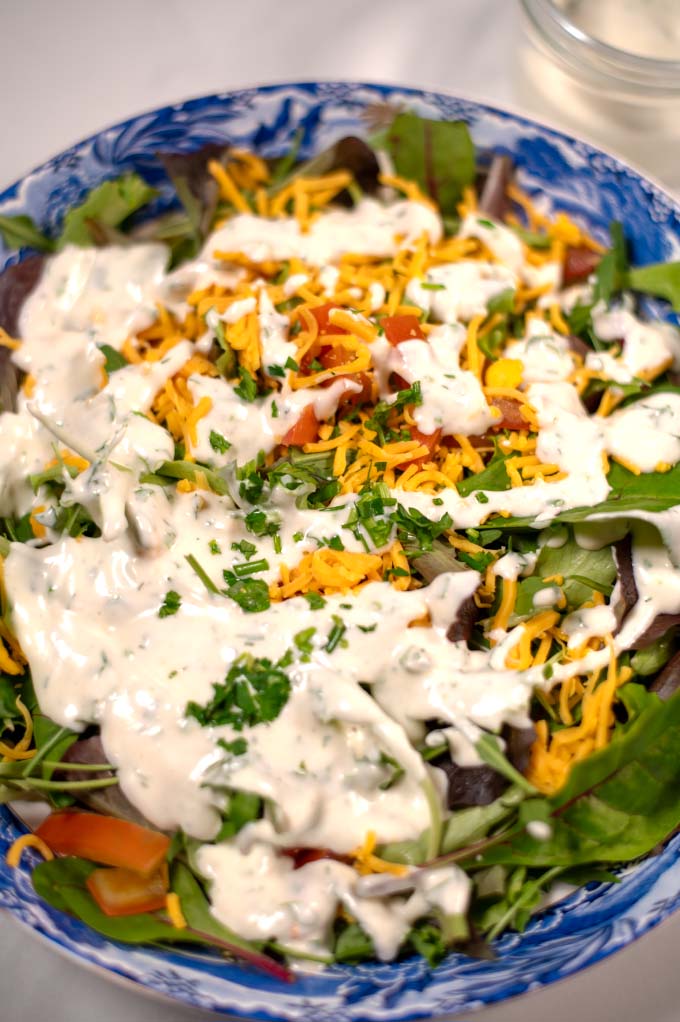 Lots of Keto Ranch Dressing over a salad.