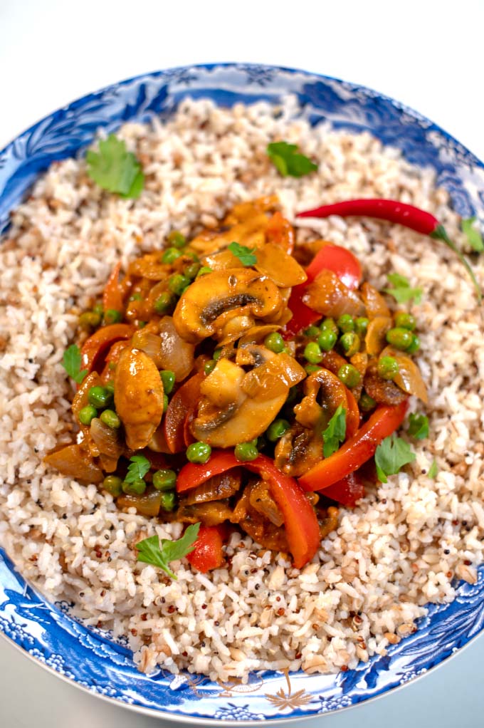 Closeup on Mushroom Curry served with wild rice.