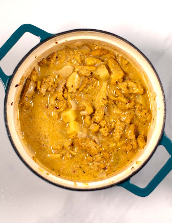 Top view of Jamaican Curry Chicken in a pot.