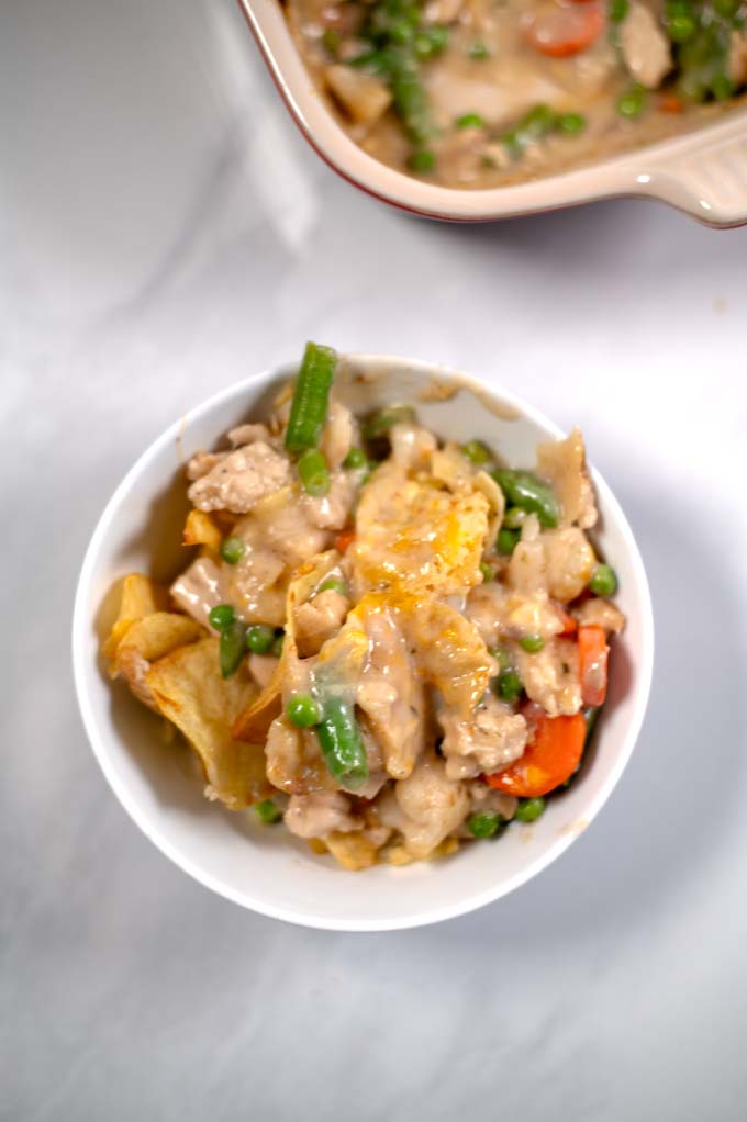 A portion of Potato Chip Casserole in a small serving bowl.