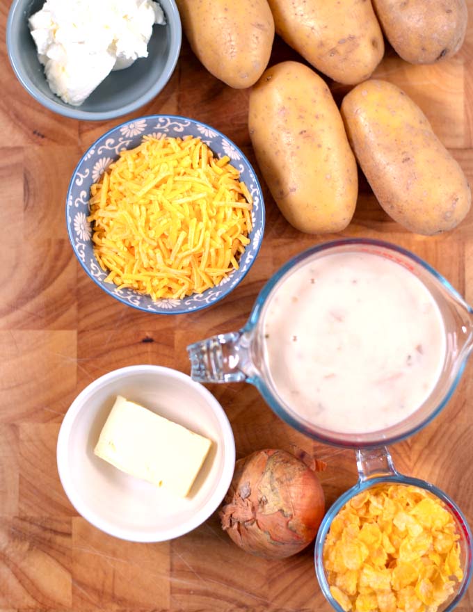Ingredients for making Texas Potatoes Casserole are collected on a board.