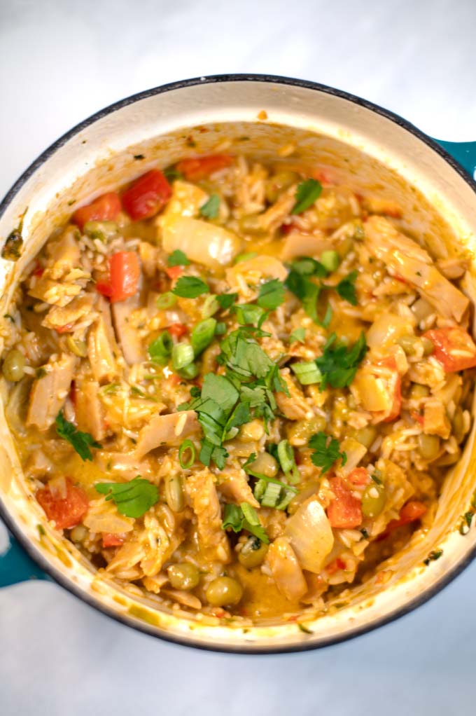 Closeup of a pot with Chicken Pelau.