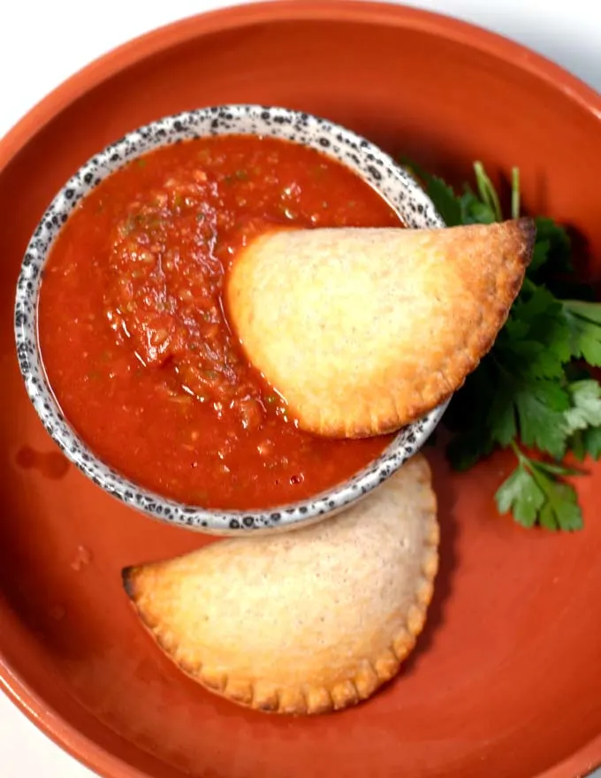 Serving of empanada sauce.