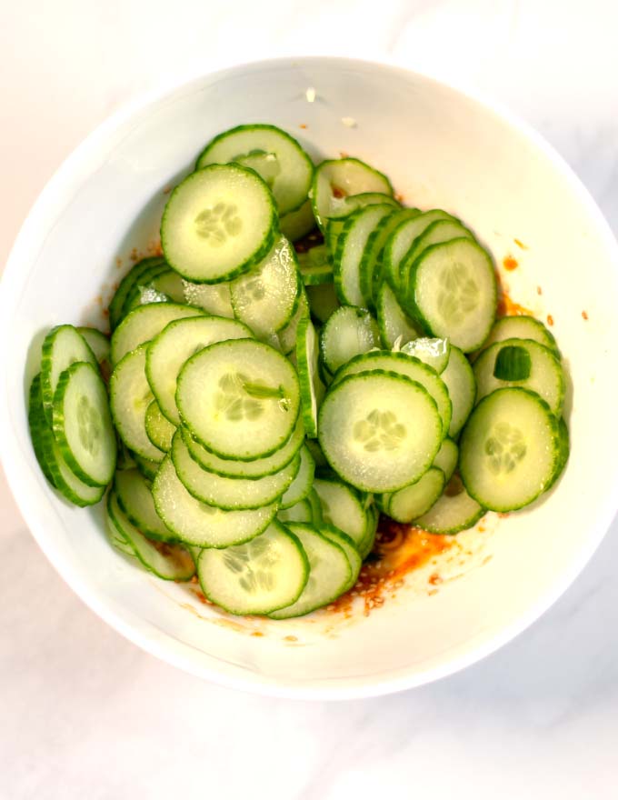 Cucumber slices are given to the dressing.