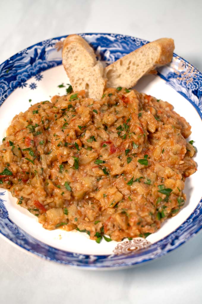Closeup of a serving of Zaalouk with bread.