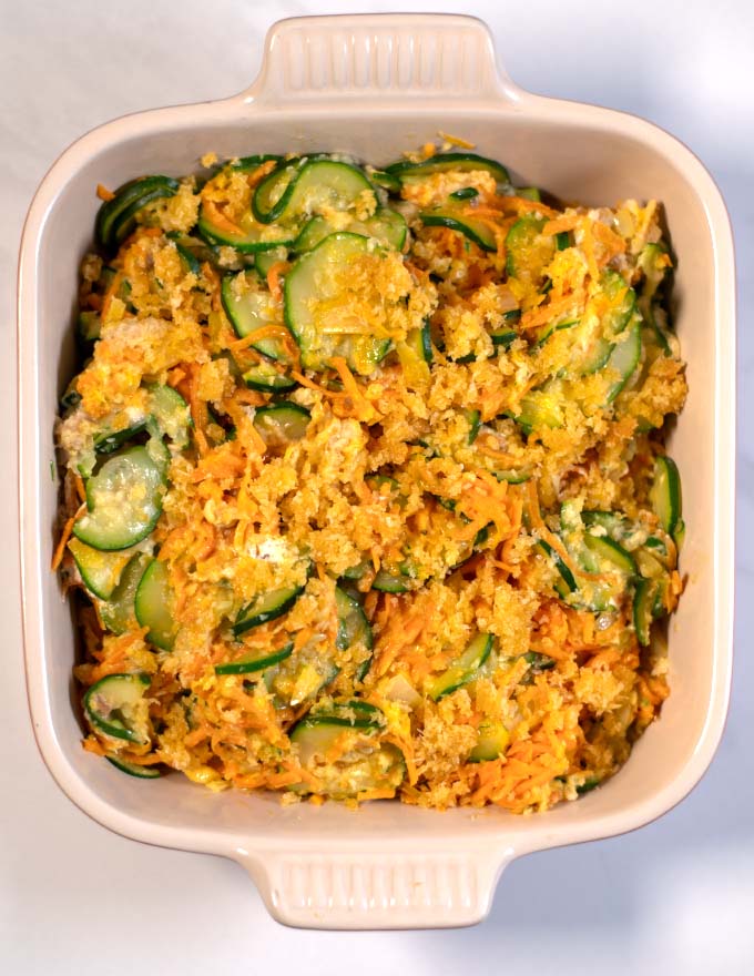 Top view of the zucchini stuffing in a casserole dish.