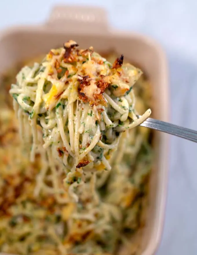 A large spoon of Monterey Jack Chicken Casserole.