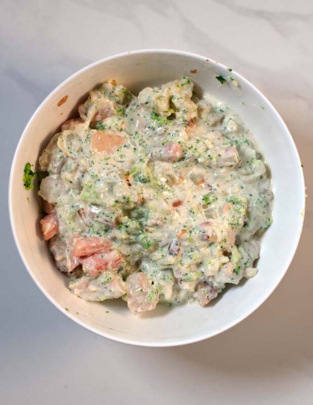 Mixed casserole filling in a bow.