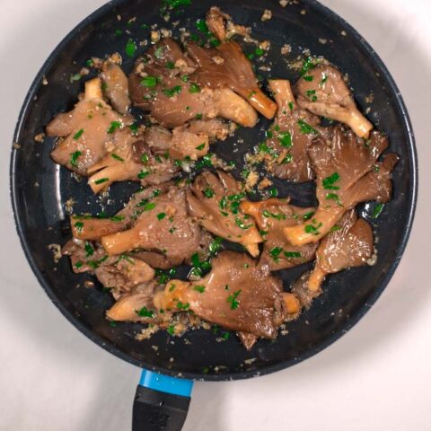 Oyster Mushrooms sauteed in butter with garlic.