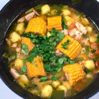 Fresh cilantro is used to garnish Sancocho.