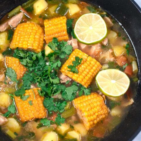 Lime juice give extra tang to Sancocho.