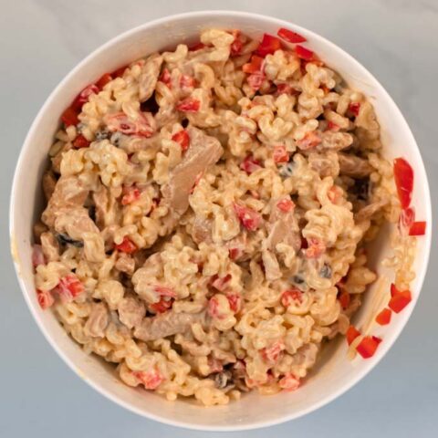 Combined Chicken Macaroni in a white bowl.