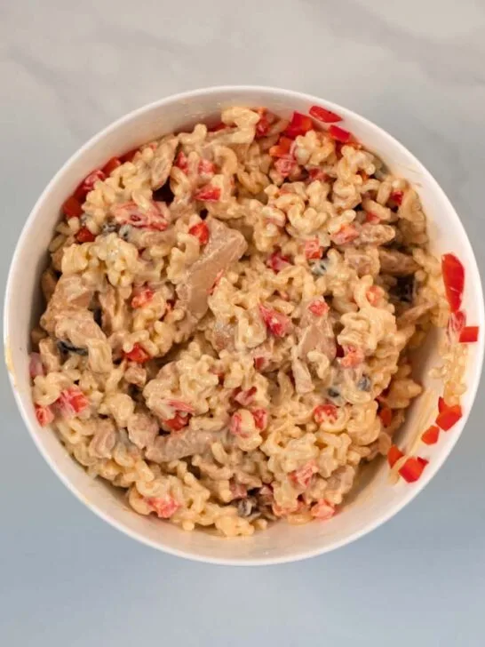 Combined Chicken Macaroni in a white bowl.