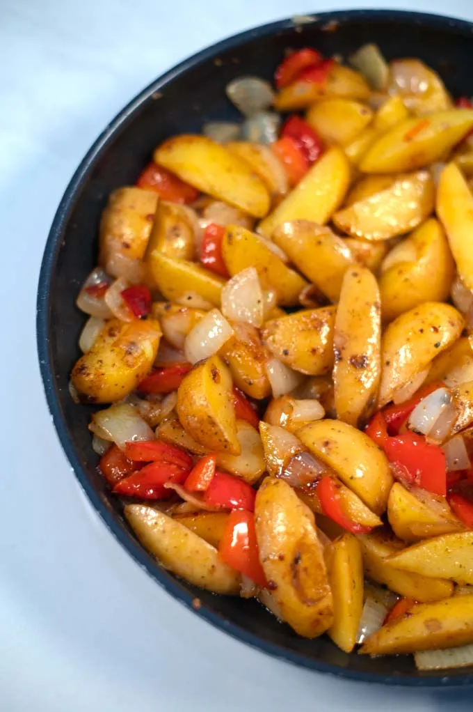 Juicy potatoes with peppers and onions.
