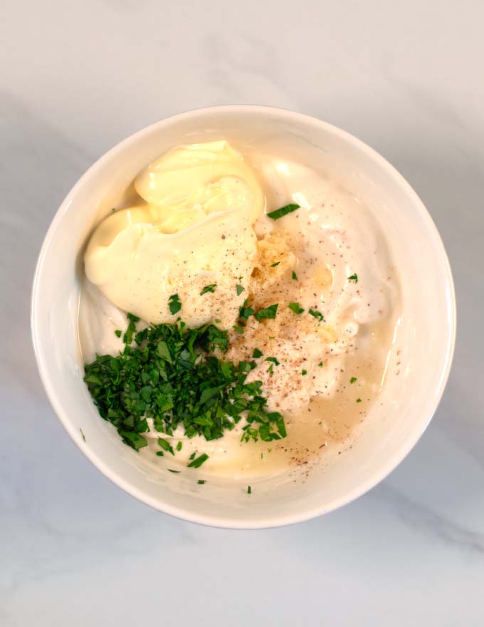 All ingredients needed for making Shawarma Sauce are given into a bowl.