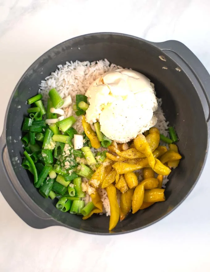 Large mixing bowl with the ingredients of the filling for this recipe.