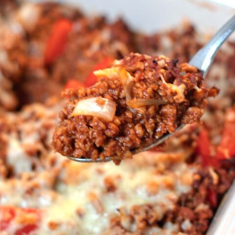 Closeup on a spoon full of Sloppy Joe Casserole.
