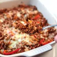 A spponful of Keto Sloppy Joe Casserole is lifted from the baking dish.