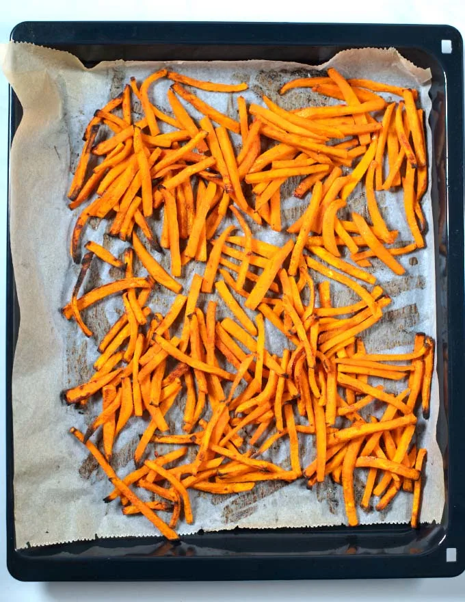 Crispy Sweet Potato Fries out of the oven after baking.