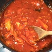 Closeup on vegan chicken bites in the sauce.