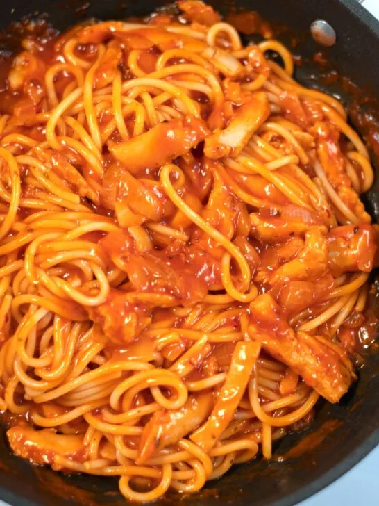 Closeup of spaghetti served with Chicken Marinara Sauce.