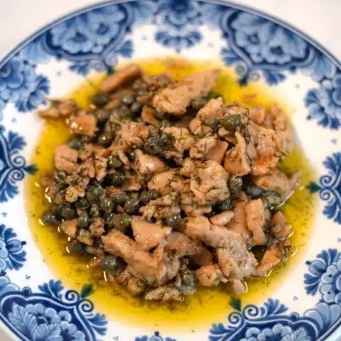 Closeup of chicken iin Lemon Caper Sauce.