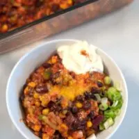 Closeup of a serving of mixed bean casserole.