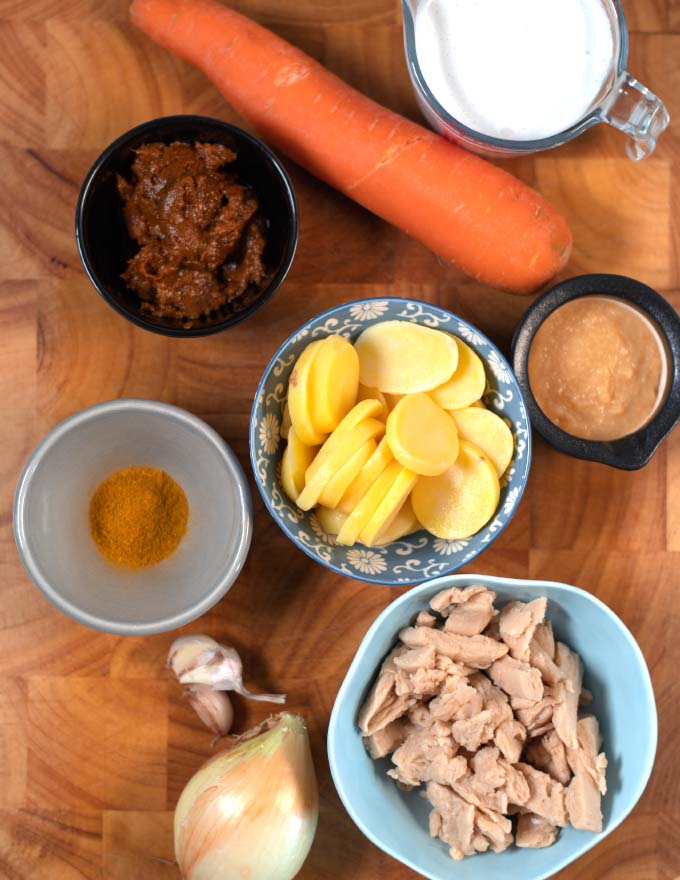 Ingredients needed to make Vietnamese Curry are collected on a board.