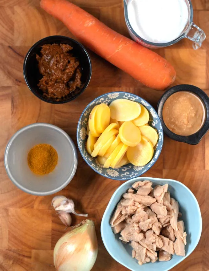 Ingredients needed to make Vietnamese Curry are collected on a board.