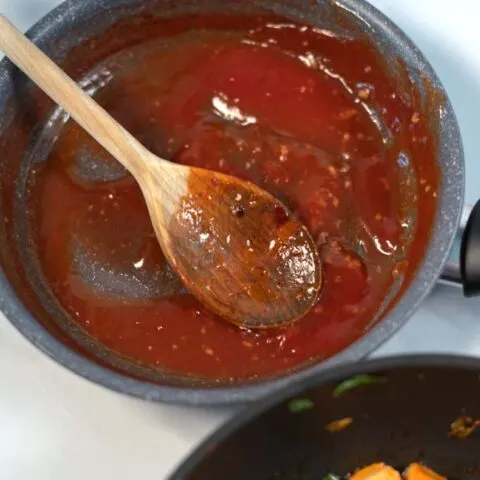 Filipino Barbecue Sauce and a wooden spoon.