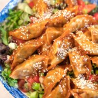 Crispy Dumplings on Salad.