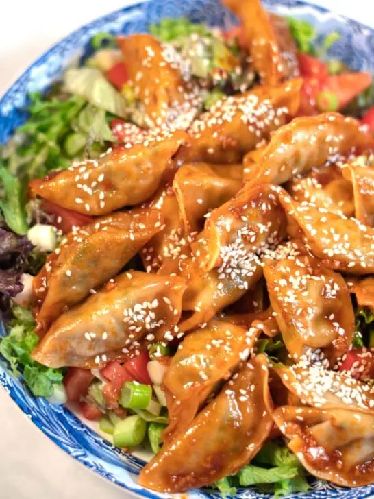 Crispy Dumplings on Salad.