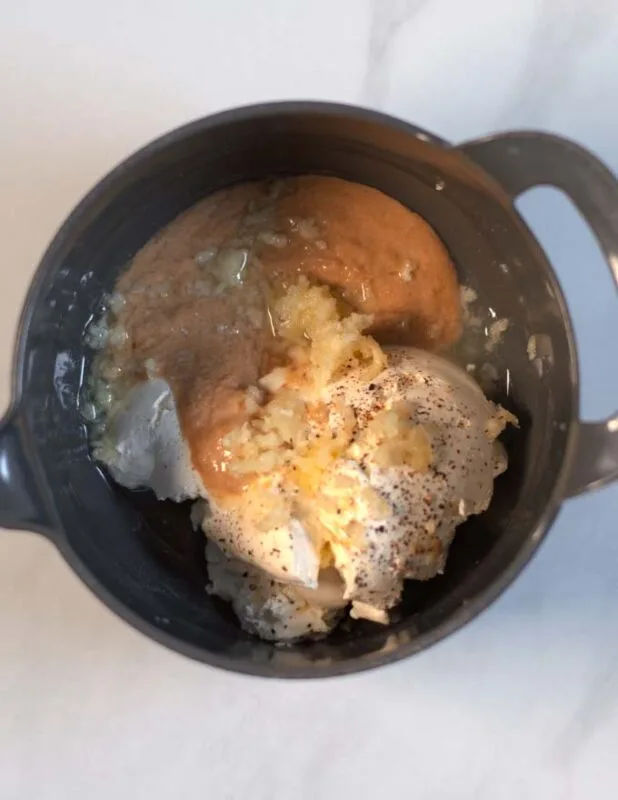All ingredients for the yogurt sauce are given to a mmixing bowl.