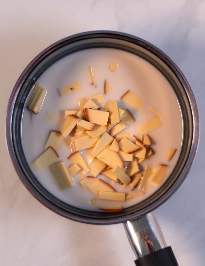 Easy and quick queso sauce ingredients in a sauce pan.